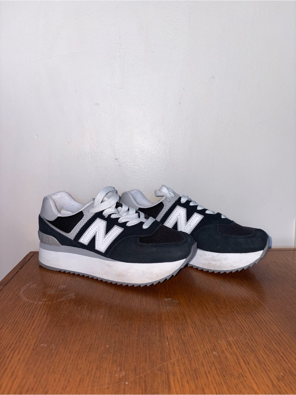 New Balance Women's Black and White Platform Sneakers with Silver Accents